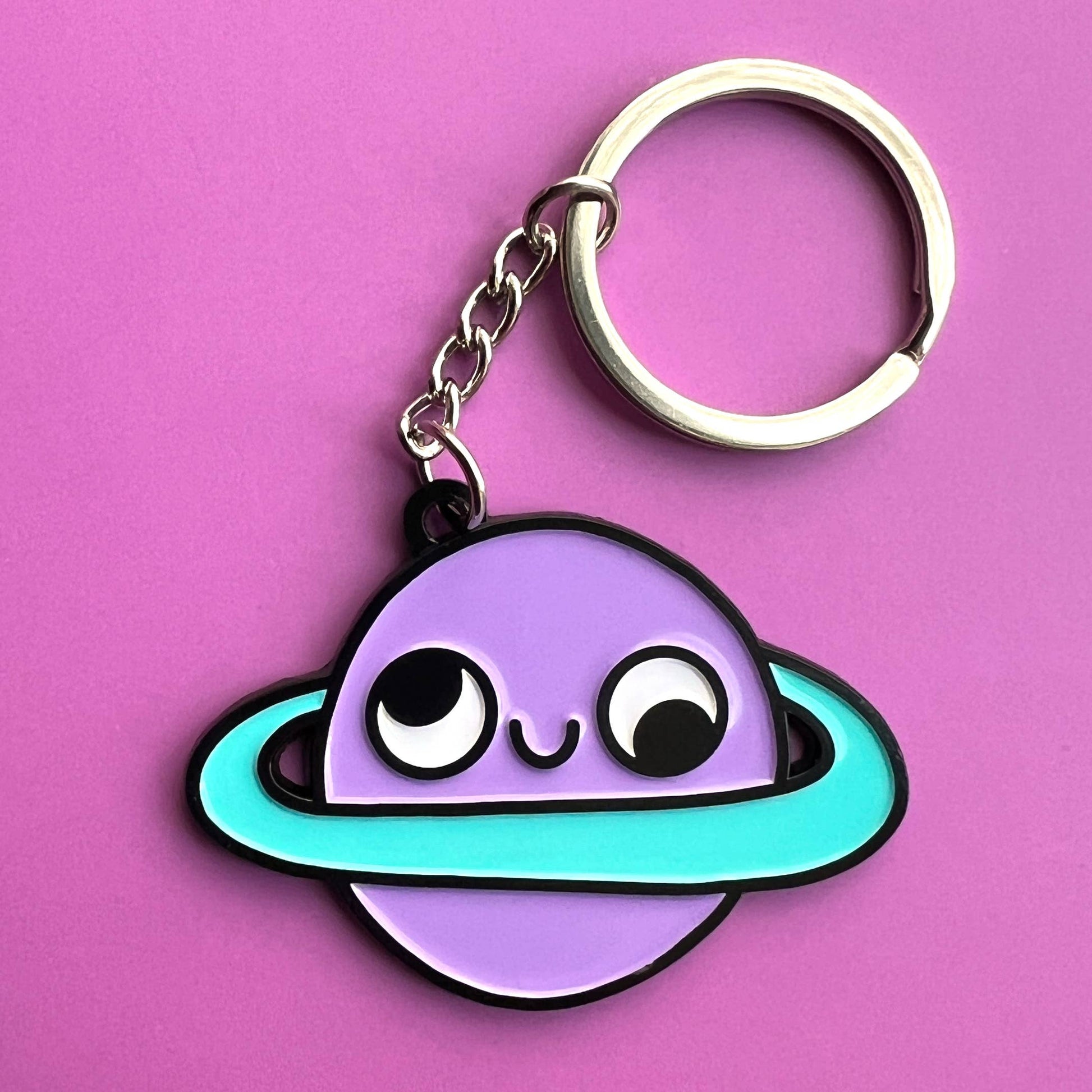 Retrograde Planet Keychain